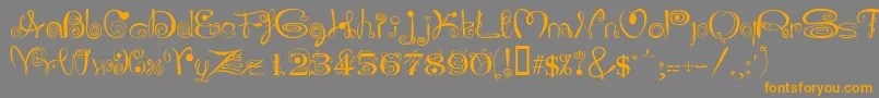 フォントJOLIS    – オレンジの文字は灰色の背景にあります。