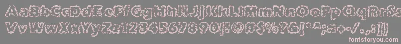 joltcaff-Schriftart – Rosa Schriften auf grauem Hintergrund