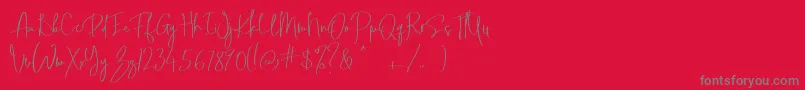 フォントJonas Beckman Two   Dafont – 赤い背景に灰色の文字