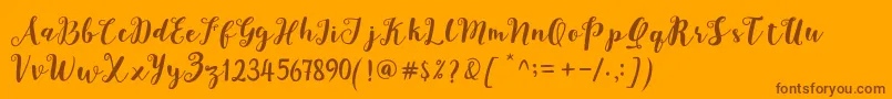 Fonte Joshan Demo – fontes marrons em um fundo laranja