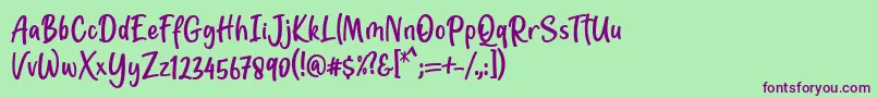 Jotilla Font by 7NTypes Font – Purple Fonts on Green Background