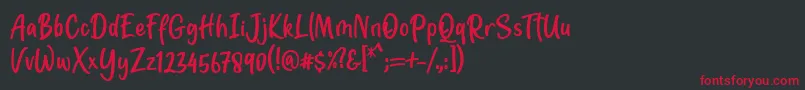 Jotilla Font by 7NTypes Font – Red Fonts on Black Background