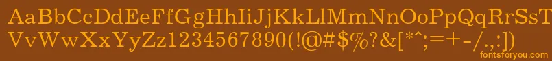 フォントJOURNAL – オレンジ色の文字が茶色の背景にあります。