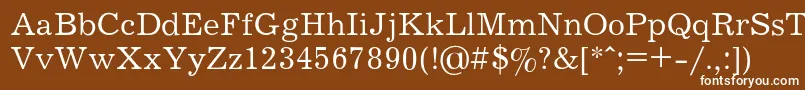 JOURNAL-fontti – valkoiset fontit ruskealla taustalla