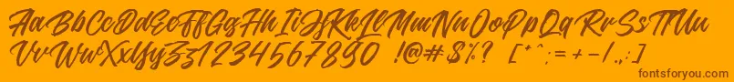 Jouska-Schriftart – Braune Schriften auf orangefarbenem Hintergrund