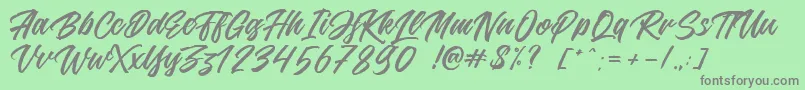 Jouska Font – Gray Fonts on Green Background