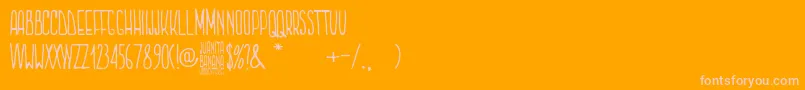 Juanita Banana-Schriftart – Rosa Schriften auf orangefarbenem Hintergrund