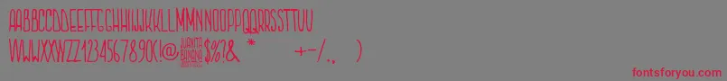 Juanita Banana-Schriftart – Rote Schriften auf grauem Hintergrund