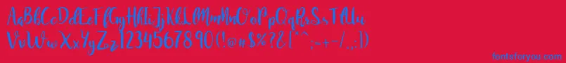 JuanitaBrushSmooth Font – Blue Fonts on Red Background