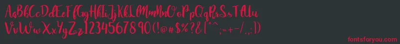 JuanitaBrushSmooth Font – Red Fonts on Black Background