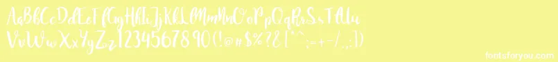 Шрифт JuanitaBrushSmooth – белые шрифты на жёлтом фоне