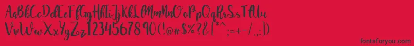 JuanitaBrushSmooth Font – Black Fonts on Red Background