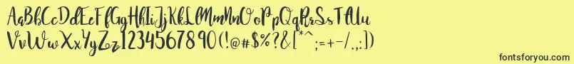 JuanitaBrushSmooth Font – Black Fonts on Yellow Background