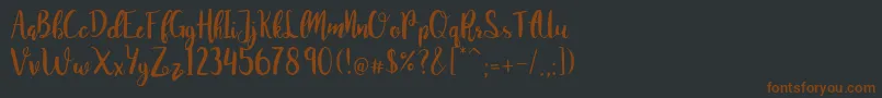 JuanitaBrushSmooth-fontti – ruskeat fontit mustalla taustalla