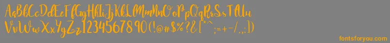 JuanitaBrushSmooth Font – Orange Fonts on Gray Background