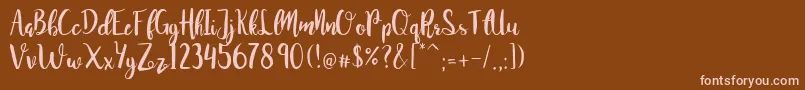 JuanitaBrushSmooth Font – Pink Fonts on Brown Background