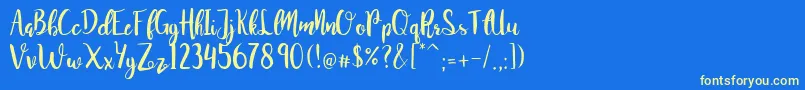 JuanitaBrushSmooth Font – Yellow Fonts on Blue Background