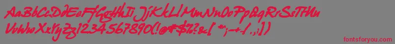 Juergen Bold Kursiv-Schriftart – Rote Schriften auf grauem Hintergrund