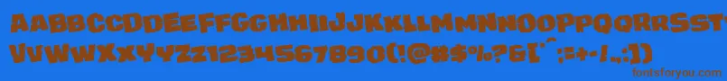 Шрифт juggerrockrotate – коричневые шрифты на синем фоне