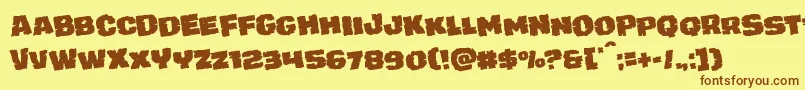 juggerrockrotate-Schriftart – Braune Schriften auf gelbem Hintergrund