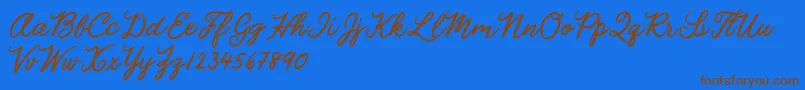Julia Lauren Font – Brown Fonts on Blue Background