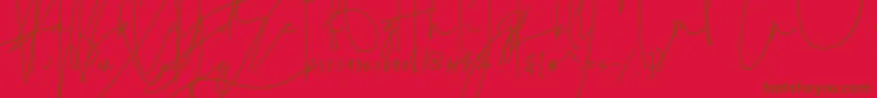 julian thomas-Schriftart – Braune Schriften auf rotem Hintergrund