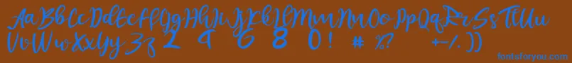 フォントjuliet – 茶色の背景に青い文字