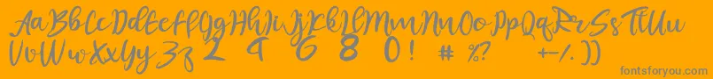 juliet-Schriftart – Graue Schriften auf orangefarbenem Hintergrund