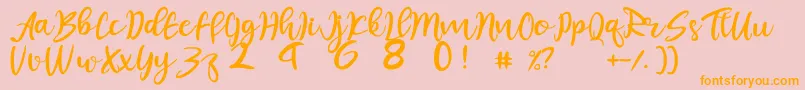 Fonte juliet – fontes laranjas em um fundo rosa