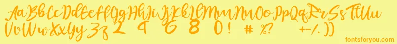 juliet-Schriftart – Orangefarbene Schriften auf gelbem Hintergrund