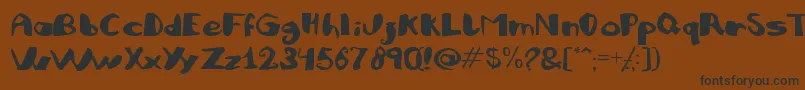 フォントJULIFB   – 黒い文字が茶色の背景にあります