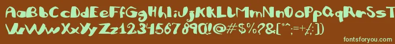 JULIFB  フォントについての詳細 フォントJULIFB   – 緑色の文字が茶色の背景にあります。
