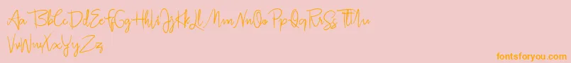 Fonte Jullia Script Personal Use Only – fontes laranjas em um fundo rosa