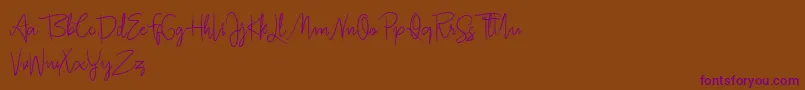Jullia Script Personal Use Only-Schriftart – Violette Schriften auf braunem Hintergrund