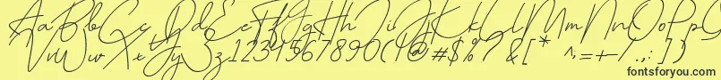 July it-Schriftart – Schwarze Schriften auf gelbem Hintergrund