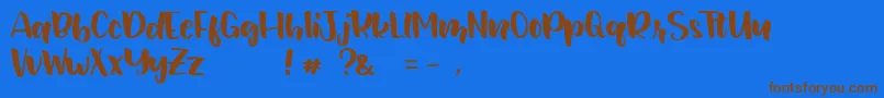 フォントJunetteDEMO Regular – 茶色の文字が青い背景にあります。