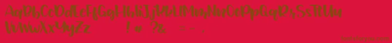 JunetteDEMO Regular-fontti – ruskeat fontit punaisella taustalla