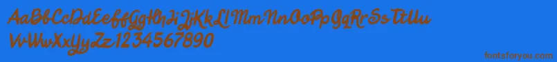 Jungle Boy Italic Font – Brown Fonts on Blue Background