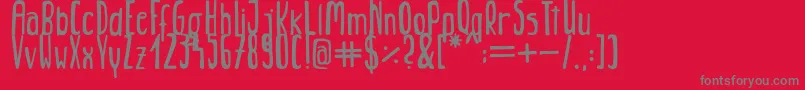 Jungle-Schriftart – Graue Schriften auf rotem Hintergrund