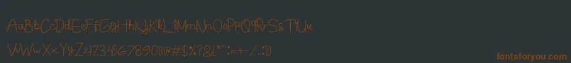 Junitta Font – Brown Fonts on Black Background