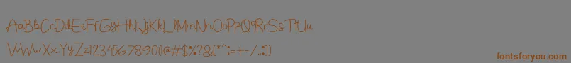 Junitta-fontti – ruskeat fontit harmaalla taustalla