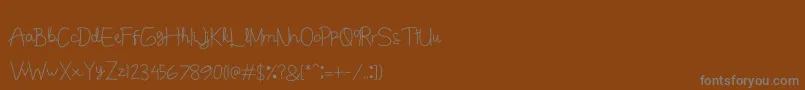Junitta Font – Gray Fonts on Brown Background
