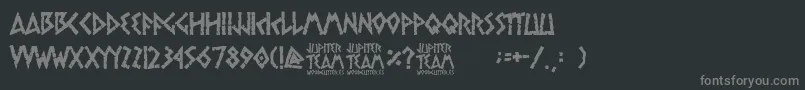jupiter team-fontti – harmaat kirjasimet mustalla taustalla