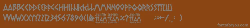 フォントjupiter team – 茶色の背景に灰色の文字