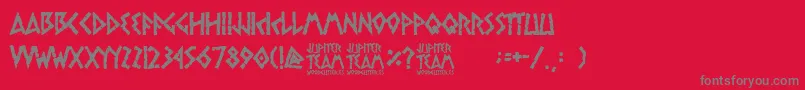 jupiter team-fontti – harmaat kirjasimet punaisella taustalla