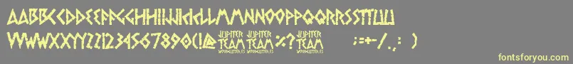 jupiter team-Schriftart – Gelbe Schriften auf grauem Hintergrund