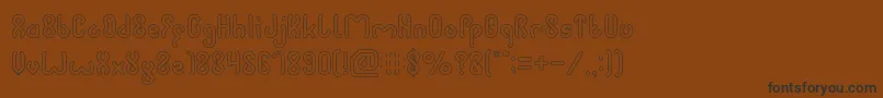 JUSSTA Hollow Font – Black Fonts on Brown Background