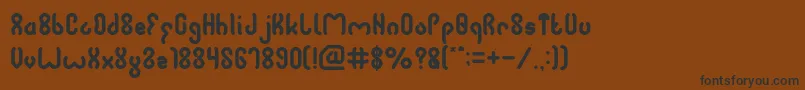 Więcej informacji o czcionce JUSSTA Czcionka JUSSTA – czarne czcionki na brązowym tle