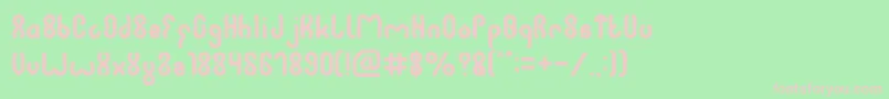 JUSSTA-fontti – vaaleanpunaiset fontit vihreällä taustalla