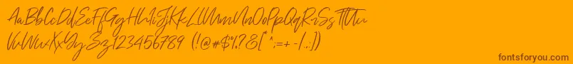 Just Kelly Justine Font – Brown Fonts on Orange Background
